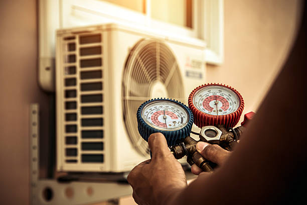 Professional Air Conditioning Service technician working in Brackenridge, PA